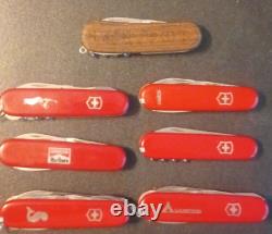 7 Victorinox Knives-1 wood scale, Fisherman, Camper, Marlboro, Golfer, Hoffritz