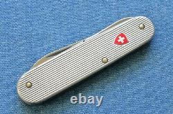 C. 1970s vintage 84mm Victorinox Ribbed Alox Red Shield Voyageur Swiss Army Knife