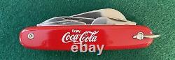 Coca-Cola Swiss Army Knife with4 blades and 3 tools. Manufactured by Colonial USA