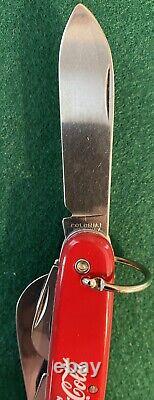 Coca-Cola Swiss Army Knife with4 blades and 3 tools. Manufactured by Colonial USA