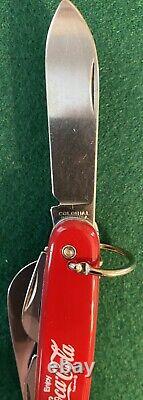 Coca-Cola Swiss Army Knife with4 blades and 3 tools. Manufactured by Colonial USA