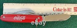 Coca-Cola Swiss Army Knife with4 blades and 3 tools. Manufactured by Colonial USA