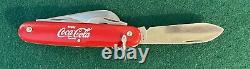 Coca-Cola Swiss Army Knife with4 blades and 3 tools. Manufactured by Colonial USA