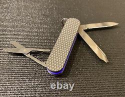 Custom Swiss Army Knife with Daily Customs Titanium Scales and Purple Glow Layer