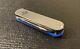 Custom Swiss Army Knife with Titainium Daily Customs Scales and Blue Turbo Glow