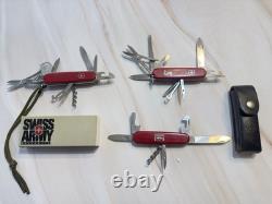LOT of Three VICTORINOX SWISS ARMY MULTI TOOL KNIVES. VINTAGE
