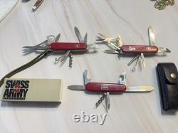 LOT of Three VICTORINOX SWISS ARMY MULTI TOOL KNIVES. VINTAGE