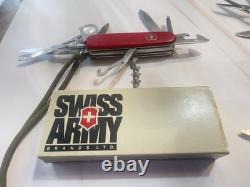 LOT of Three VICTORINOX SWISS ARMY MULTI TOOL KNIVES. VINTAGE