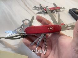 LOT of Three VICTORINOX SWISS ARMY MULTI TOOL KNIVES. VINTAGE