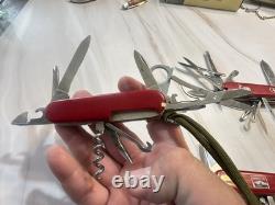 LOT of Three VICTORINOX SWISS ARMY MULTI TOOL KNIVES. VINTAGE