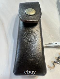 LOT of Three VICTORINOX SWISS ARMY MULTI TOOL KNIVES. VINTAGE