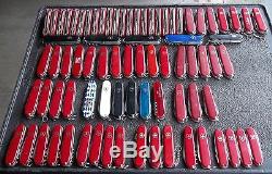 Lot of 131 mostly Victorinox and Wenger Swiss army knife 15.75 lbs