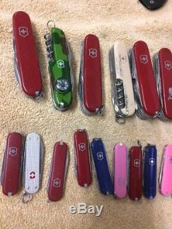 Lot of 20-SMALL, Med And Large Victorinox Swiss Army Knives