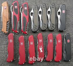 Lot of 20 Wenger and Victorinox Swiss army knives, 6 fat ones and 14 long ones