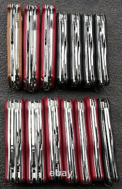 Lot of 20 Wenger and Victorinox Swiss army knives, 6 fat ones and 14 long ones