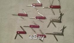 Lot of (24)Rare/Retire Wenger swiss Army Knife