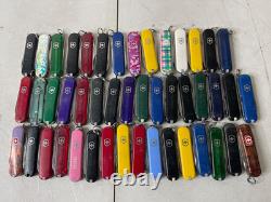 Lot of 46 Assorted Victorinox Classic SD Swiss Army Knives 58mm With & WithO Ads