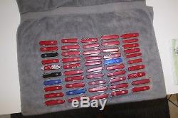 Lot of 50 Large and Medium Swiss Army knives all Victorinox and Wenger