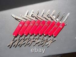 Lot of 80 Classic Victorinox Swiss Army knives. No Ad, any combo of red or black