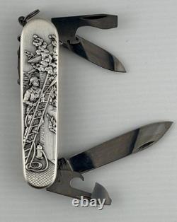 MINT Victorinox Spartan Firefighter carved stainless steel handle knife