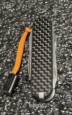 New Victorinox MiniChamp withCustom Real Carbon Fiber Scales 58mm Swiss Army Knife