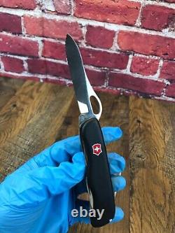 Pre-Owned VICTORINOX SWISS ARMY RESCUE TOOL POCKET KNIFE BLACK ONE HAND TREKKER