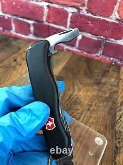 Pre-Owned VICTORINOX SWISS ARMY RESCUE TOOL POCKET KNIFE BLACK ONE HAND TREKKER