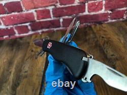 Pre-Owned VICTORINOX SWISS ARMY RESCUE TOOL POCKET KNIFE BLACK ONE HAND TREKKER