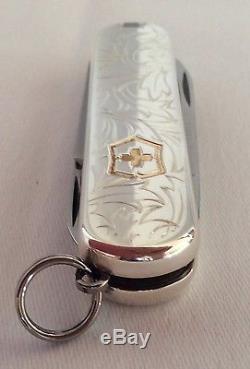 TIFFANY & CO. Sterling silver & gold with unique design pattern Swiss army knife