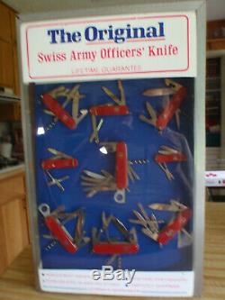 The Original Display Cabinet With Nine Swiss Army Knives All Sizes