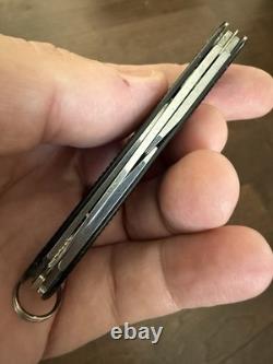 Ultra Rare Victorinox Cadet Alox Black with Red Shield