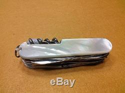 Victrorinox Champian Swiss Army Officefs Knife With Pearl Handle