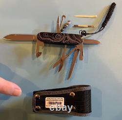 Victorinox, BRAND NEW, titanium +graded scales, lanyard access Victorinox sheath