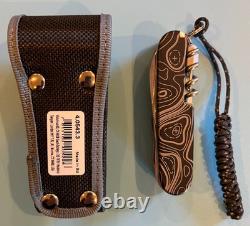 Victorinox, BRAND NEW, titanium +graded scales, lanyard access Victorinox sheath