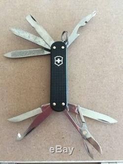 Victorinox Black Alox Minichamp Swiss Army Knife. NIB