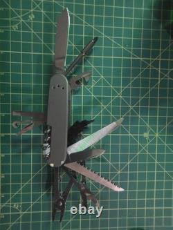 Victorinox Cyber Tool L 1.7925. T Daily Customs Titanium Handles Swiss Army