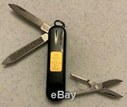 Victorinox Swiss Army Knife Classic SD Black With Suisse 1 gram gold ingot 58mm