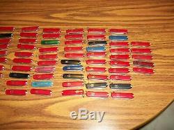 Victorinox Swiss Army Knife lot of 100 some are new all in working order