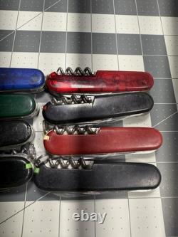 Victorinox Swiss Army Pocket Knives Lot OF 8 4 Climber 4 Campers 8748