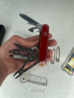 Victorinox Swiss Champ Swiss Army Knife, 33 Functions, Pouch, Flint, Compass A++