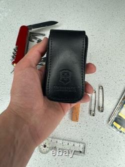 Victorinox Swiss Champ Swiss Army Knife, 33 Functions, Pouch, Flint, Compass A++