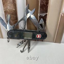 Victorinox Voyager Swiss Army knife- used, retired excellent digital clock #9865