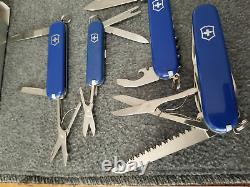 Victorinox lot four different sizes in blue Huntsman Waiter Ambassador Caddy