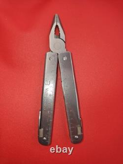 Vintage Victorinox Swiss tool Swiss Army Knife Multi Tool! WITH SHEATH
